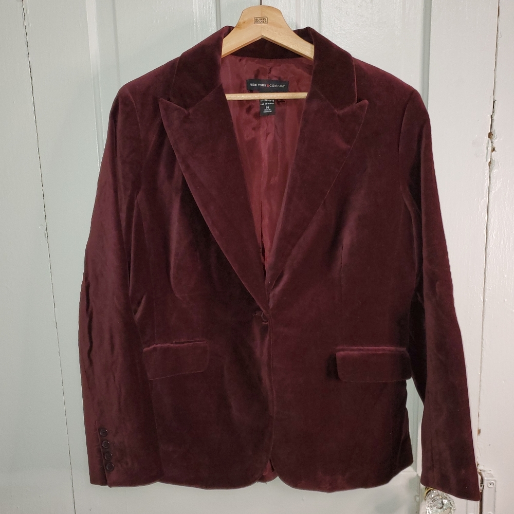 Burgandy/wine colored velvet blazer.